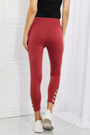 Yelete Ready For Action Full Size Ankle Cutout Active Leggings in Brick Red
